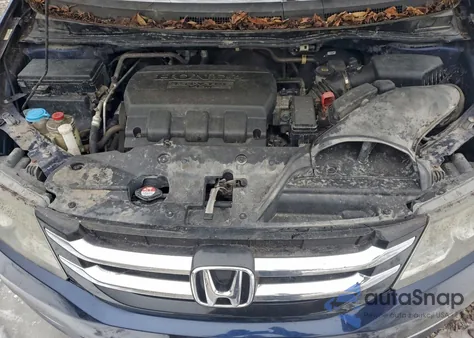 2014 Honda Odyssey Exl z USA, uszkodzony, nr VIN 5FNRL5H65EB061440